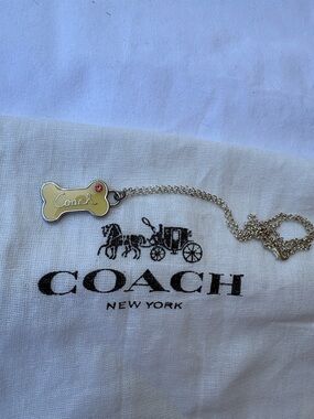 Coach Yellow Enamel Bone Pendant Necklace with Pink Crystal